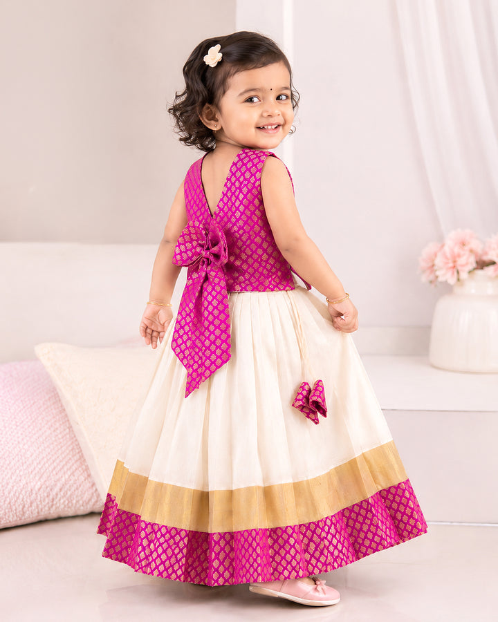 Onam special cream and pink Kasavu lehenga choli for baby girl, Stanwells Kids