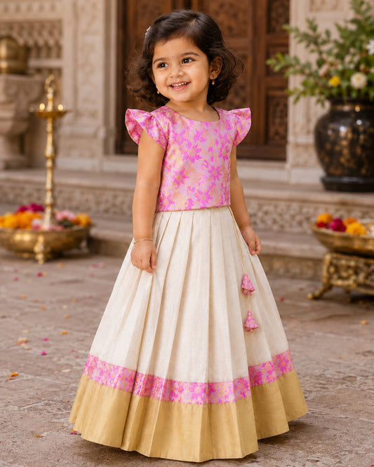 Cream and pink tissue gold pure Banarasi brocade Onam traditional lehenga for baby girl – front view, Stanwells Kids