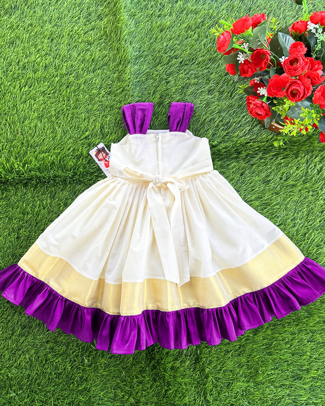 Stanwells Kids cream purple Kerala kasavu handloom flower frock brand view