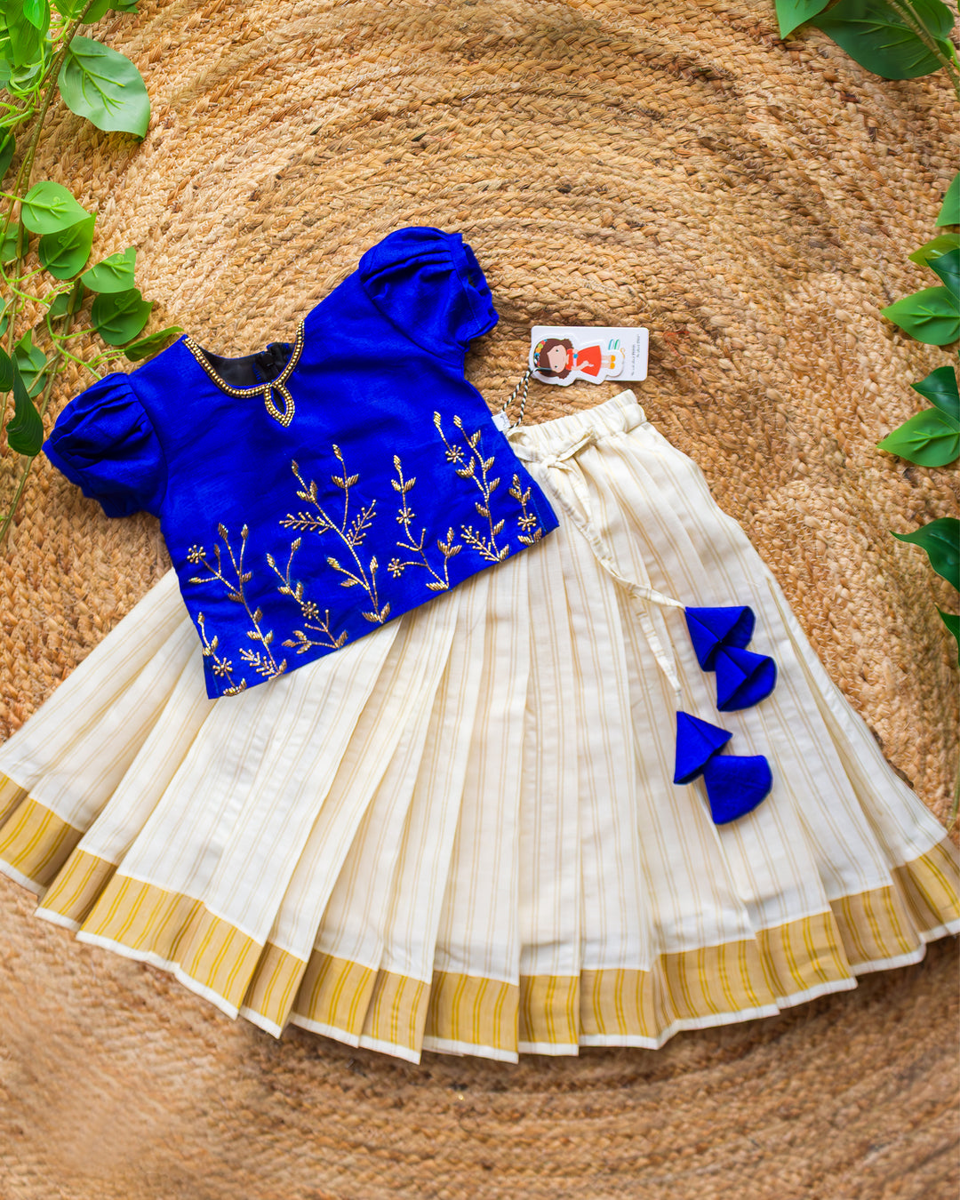 Cream royal blue kasavu handwork lehenga golden bead blouse detail – Stanwells Kids