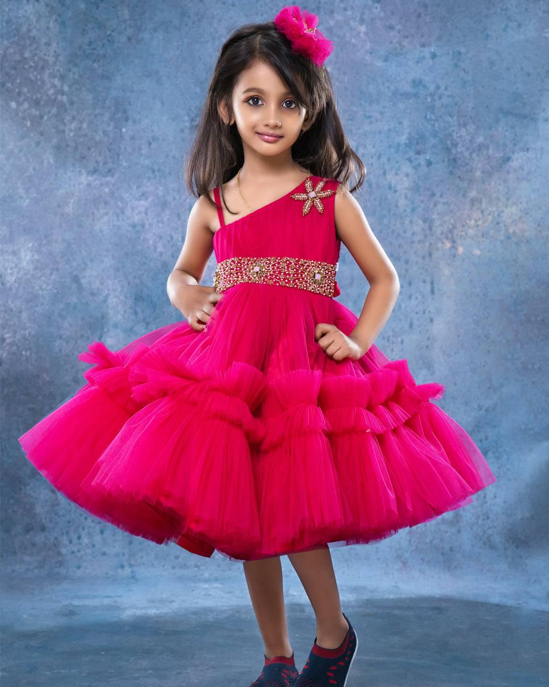 Ranypink Shade Pleated Handworked Ruffled Frock
Material:  Ranypink Shade Pleated Ruffled Frock is made with mono net with layered and ruffles on the end portion. Yoke portion is designed with pleated pattern and