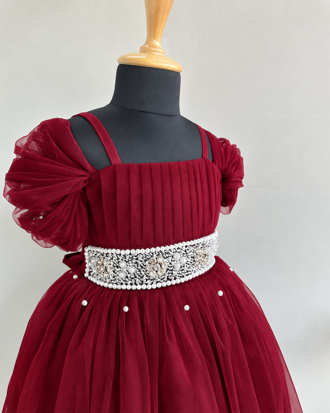 Full-length sweeping skirt on dark maroon burgundy birthday gown – Stanwells Kids