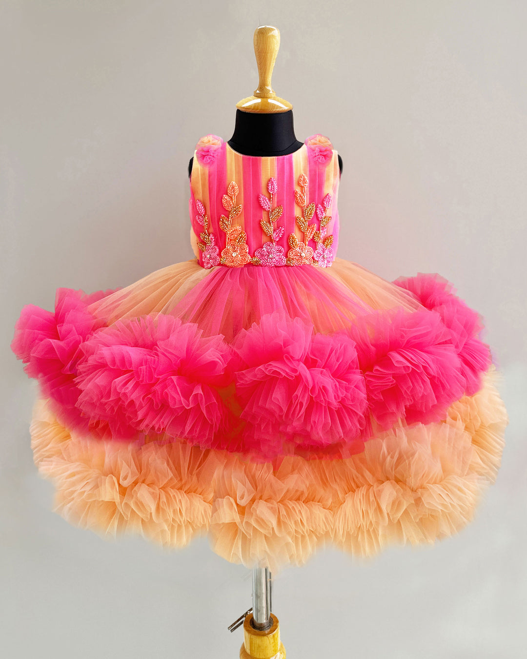 Blush and coral baby girl birthday dress with ruffles – party wear outfit for 1st birthday celebrations