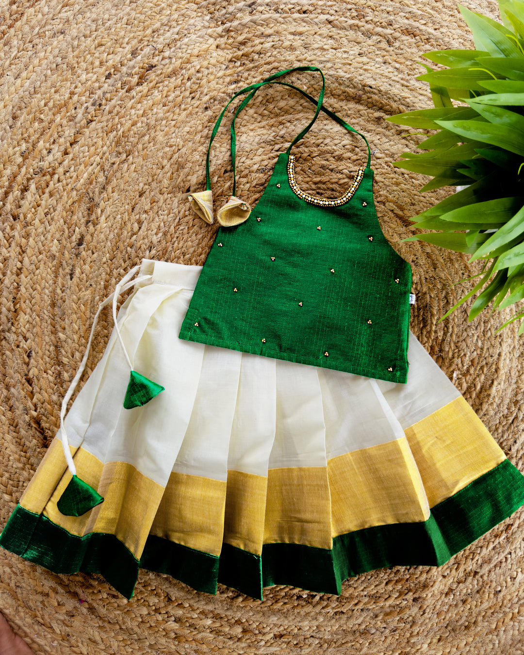 green handwork lehenga choli for kids, kids onam special dresses, onam 2024, kerala kasavu dresses for kids, kettudupu for kids, kids pattu pavadai
