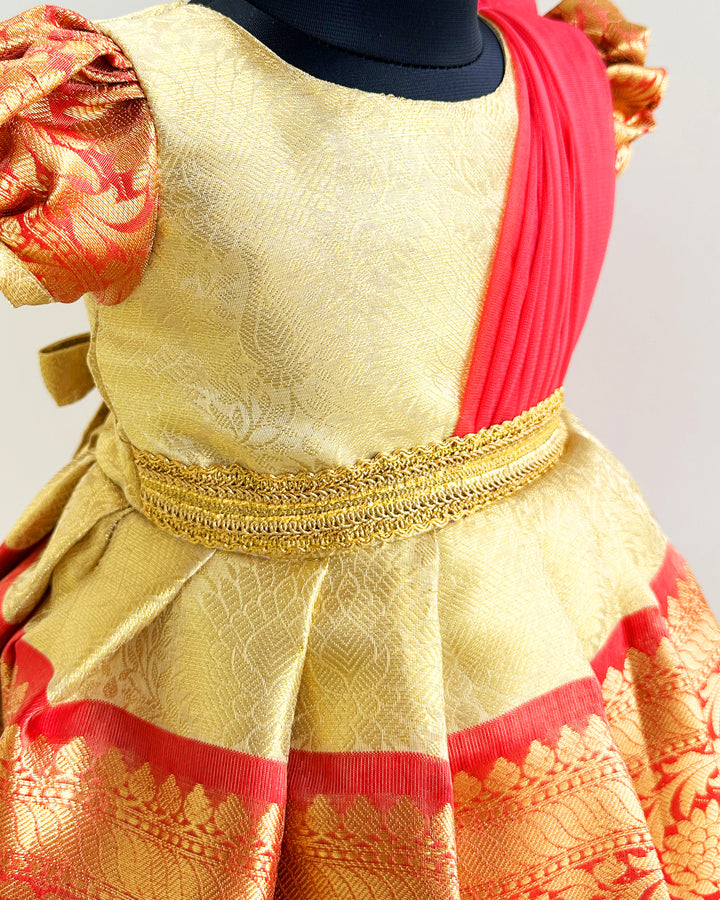 Gold and peach Banarasi silk saree frock for baby girls

Traditional puff sleeve dress for kids

Banarasi silk birthday dress for girls

Baby girls ethnic wear frock

Festive partywear for toddlers

Gold peach traditional frock for baby girls

Stanwells Kids birthday collection