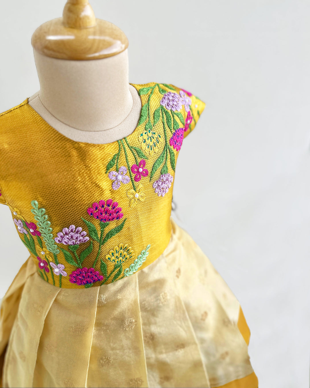 Golden silk birthday dress for baby girls with floral embroidery – Onam special frock

