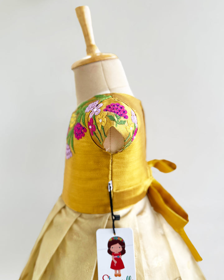 Golden silk birthday dress for baby girls with floral embroidery – Onam special frock

