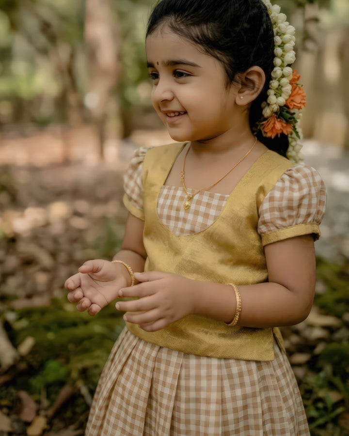 baby girl golden lehenga choli birthday dress
Kerala tissue chanderi lehenga for baby girl
traditional baby girl festive outfit India
baby girl ethnic lehenga choli gold dress
birthday dress for baby girl traditional wear