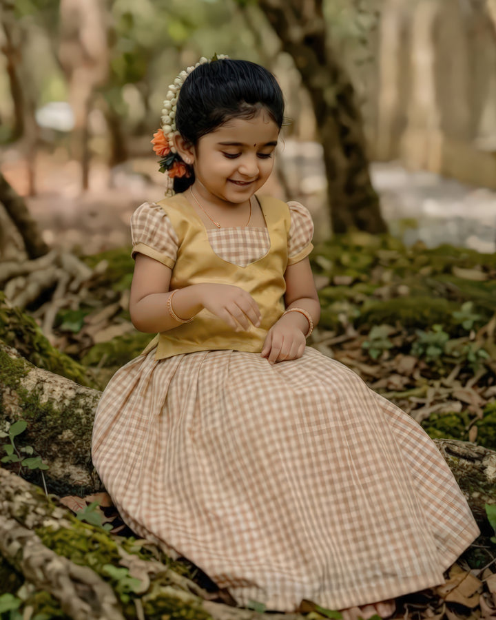 baby girl golden lehenga choli birthday dress
Kerala tissue chanderi lehenga for baby girl
traditional baby girl festive outfit India
baby girl ethnic lehenga choli gold dress
birthday dress for baby girl traditional wear