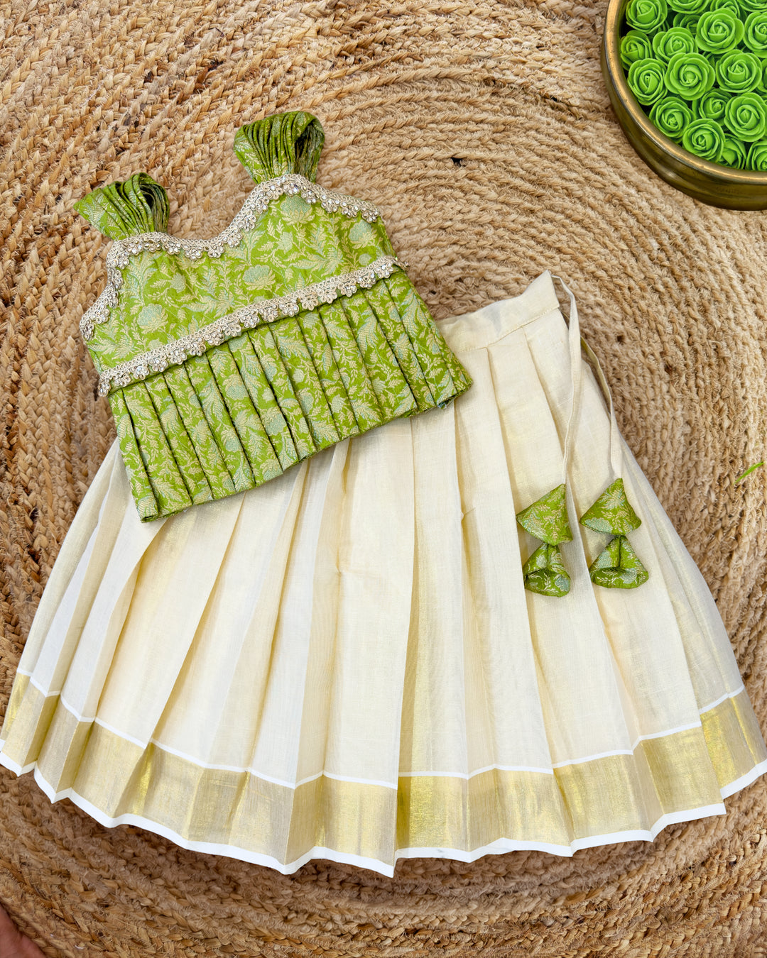 Green Banarasi brocade Kerala traditional lehenga choli for baby girl – front view, Stanwells Kids