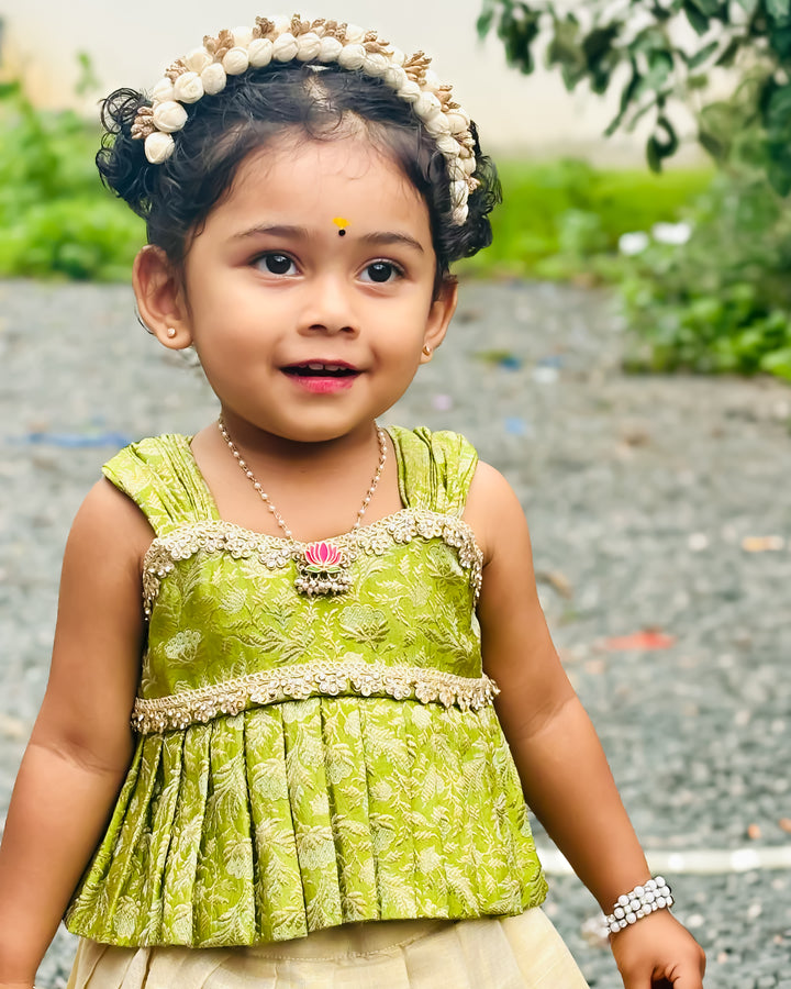 Green Banarasi brocade Kerala traditional lehenga choli for baby girl – front view, Stanwells Kids