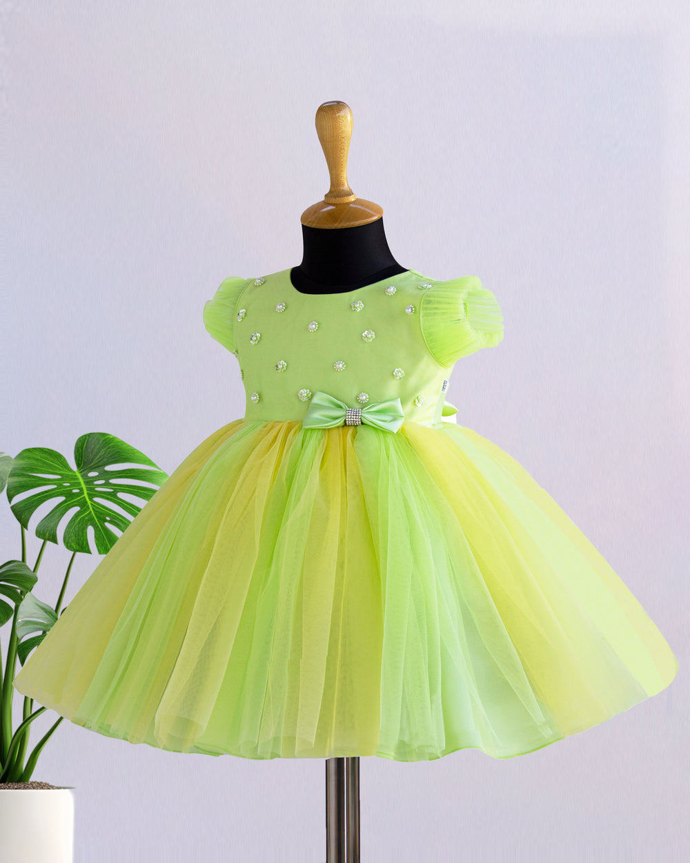 Light green and baby yellow birthday frock for baby girls

Partywear dress for girls 6M–8Y

Stylish dual-color frock for toddlers

Elegant baby girls birthday outfit

Festive wear frock for kids

Stanwells Kids yellow green party dress

Designer birthday frock for baby girls