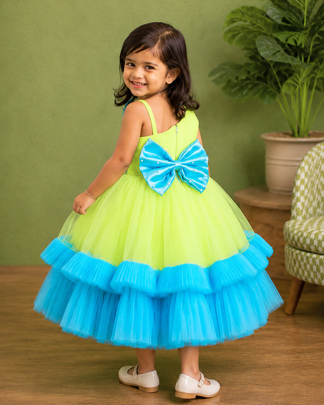 Sky blue ruffle hem and pleated skirt on lime green partywear gown – Stanwells Kids