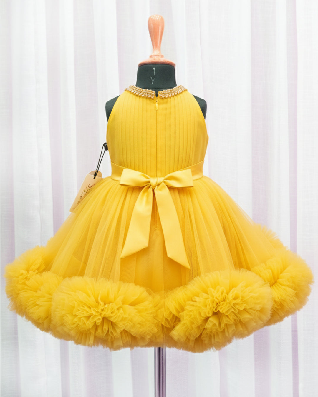 Mango yellow ruffled birthday dress for baby girls, pleated halter neck frock, stylish partywear outfit by Stanwells Kids