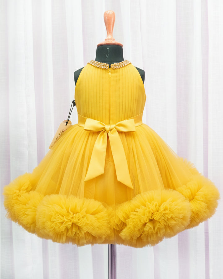Mango yellow ruffled birthday dress for baby girls, pleated halter neck frock, stylish partywear outfit by Stanwells Kids