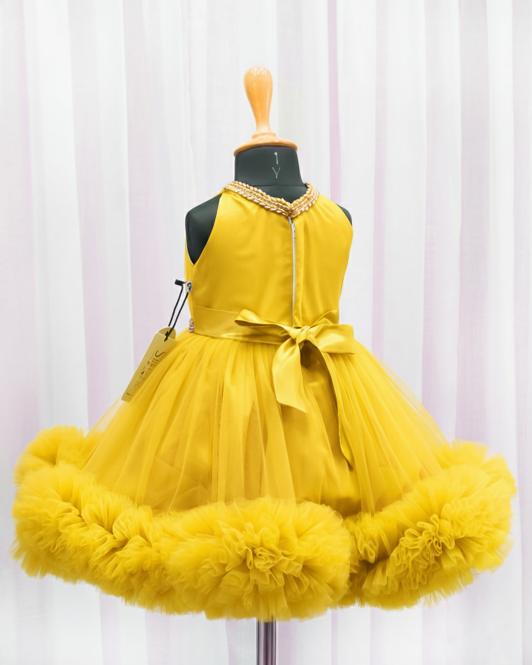 Mango yellow ruffled birthday dress for baby girls, pleated halter neck frock, stylish partywear outfit by Stanwells Kids