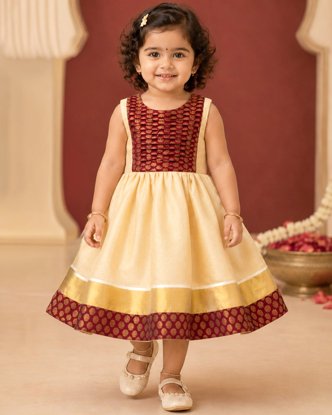 Maroon brocade Onam special tissue frock for baby girl – front view, Stanwells Kids