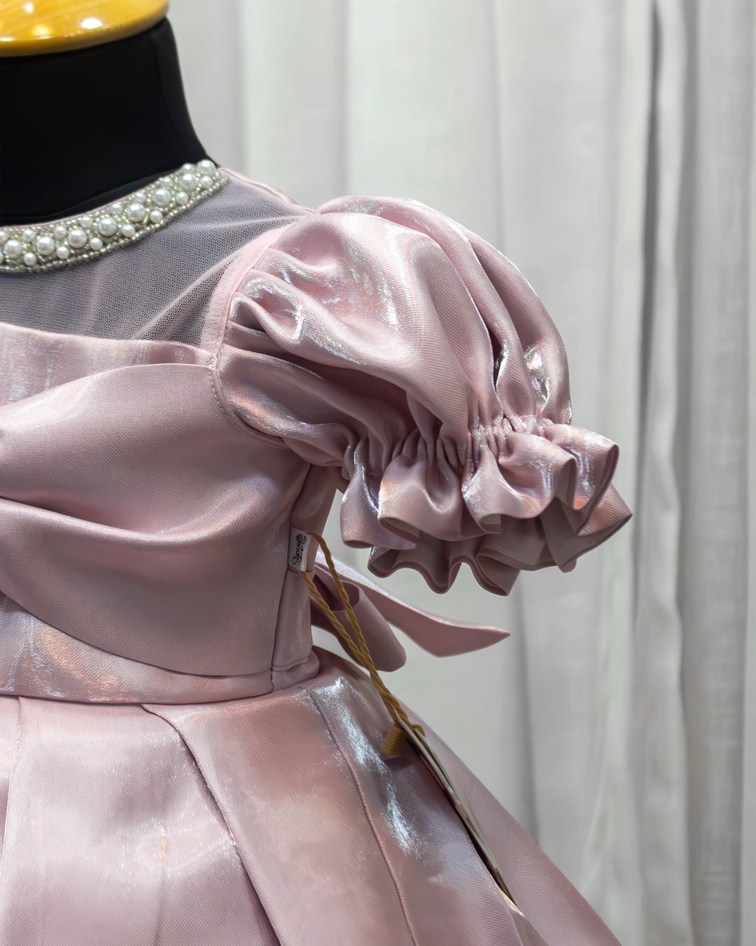 Flared glossy satin skirt on metallic pink bow birthday frock – Stanwells Kids