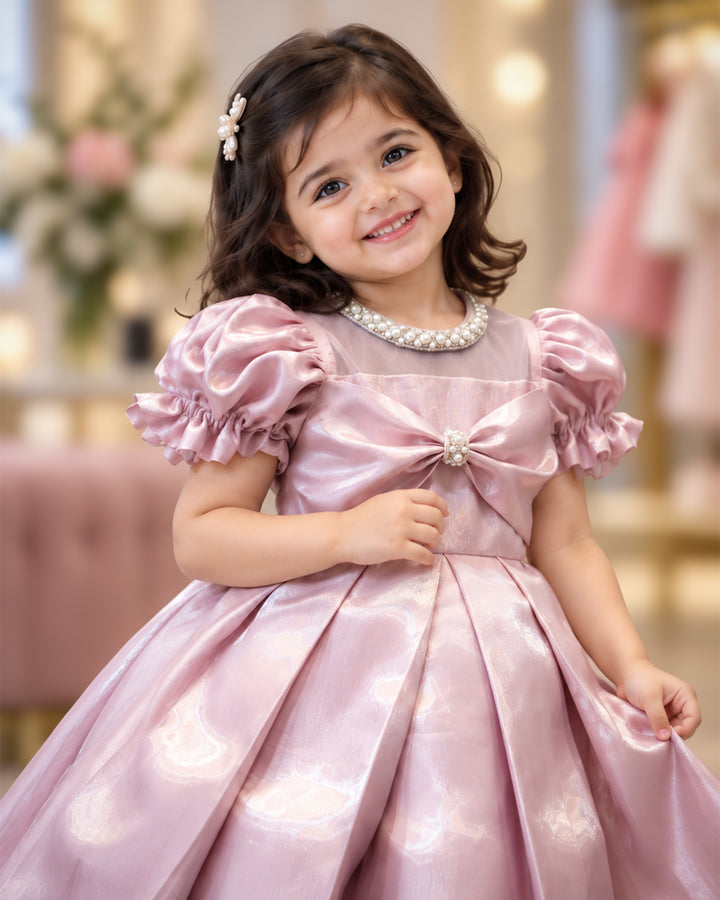 Charming bow accent detail on metallic pink satin partywear frock – Stanwells Kids