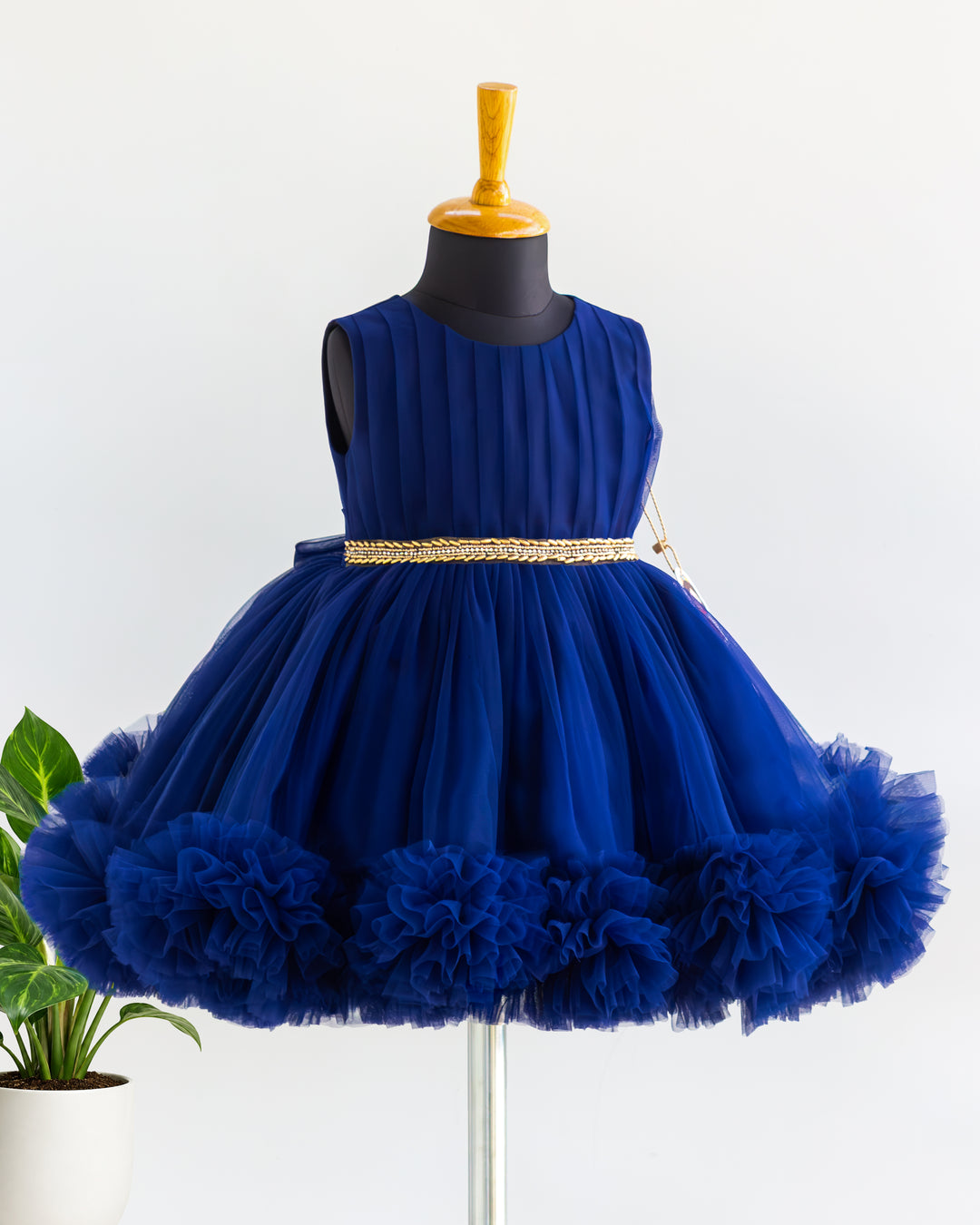 Navy blue shade ruffles sleeveless partywear frock for baby girl – front view, Stanwells Kids