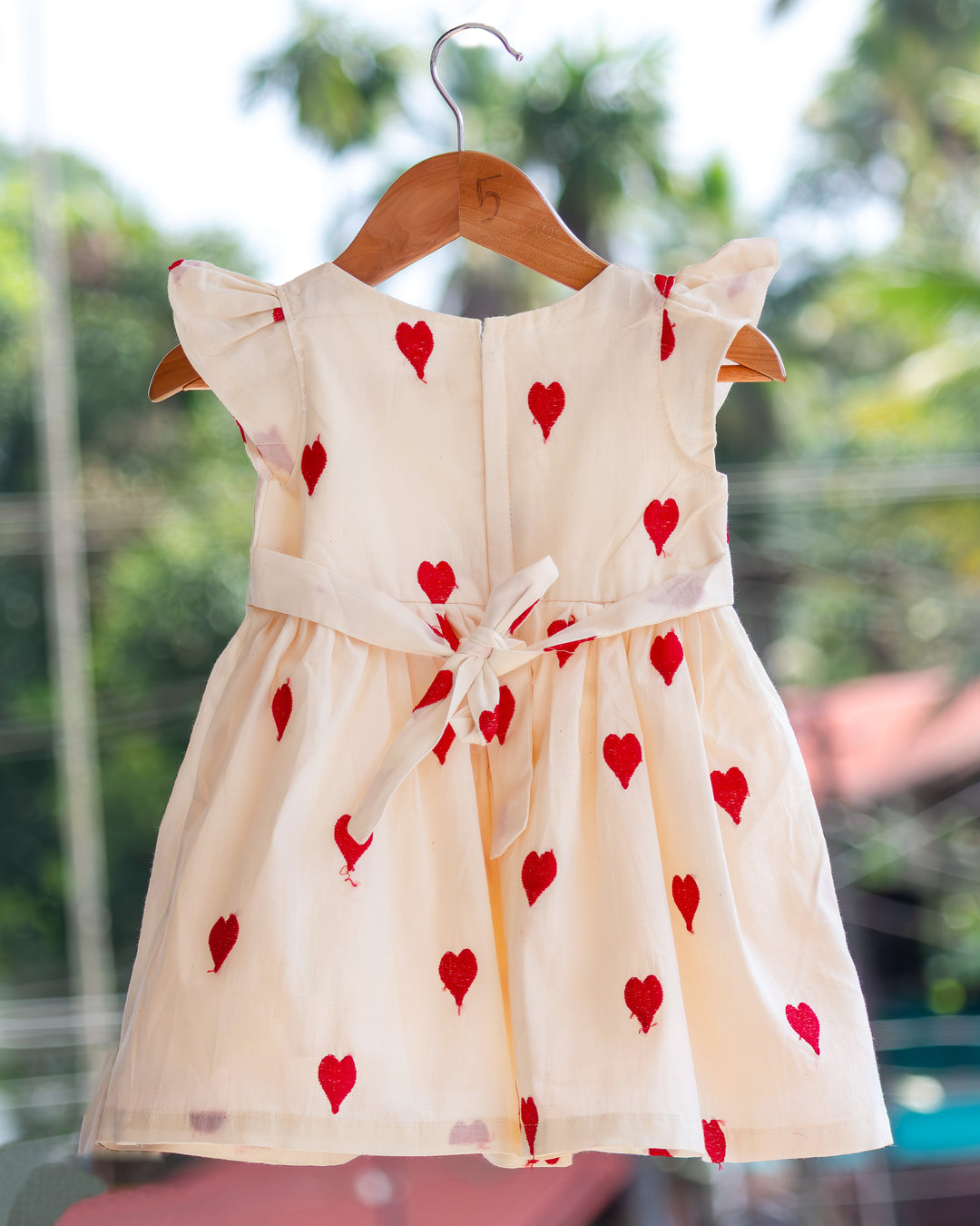 baby girls off white birthday dress

cotton birthday dress for baby girls

heart embroidery baby girl partywear dress

baby girls birthday party dress India

off white baby girl frock for birthday