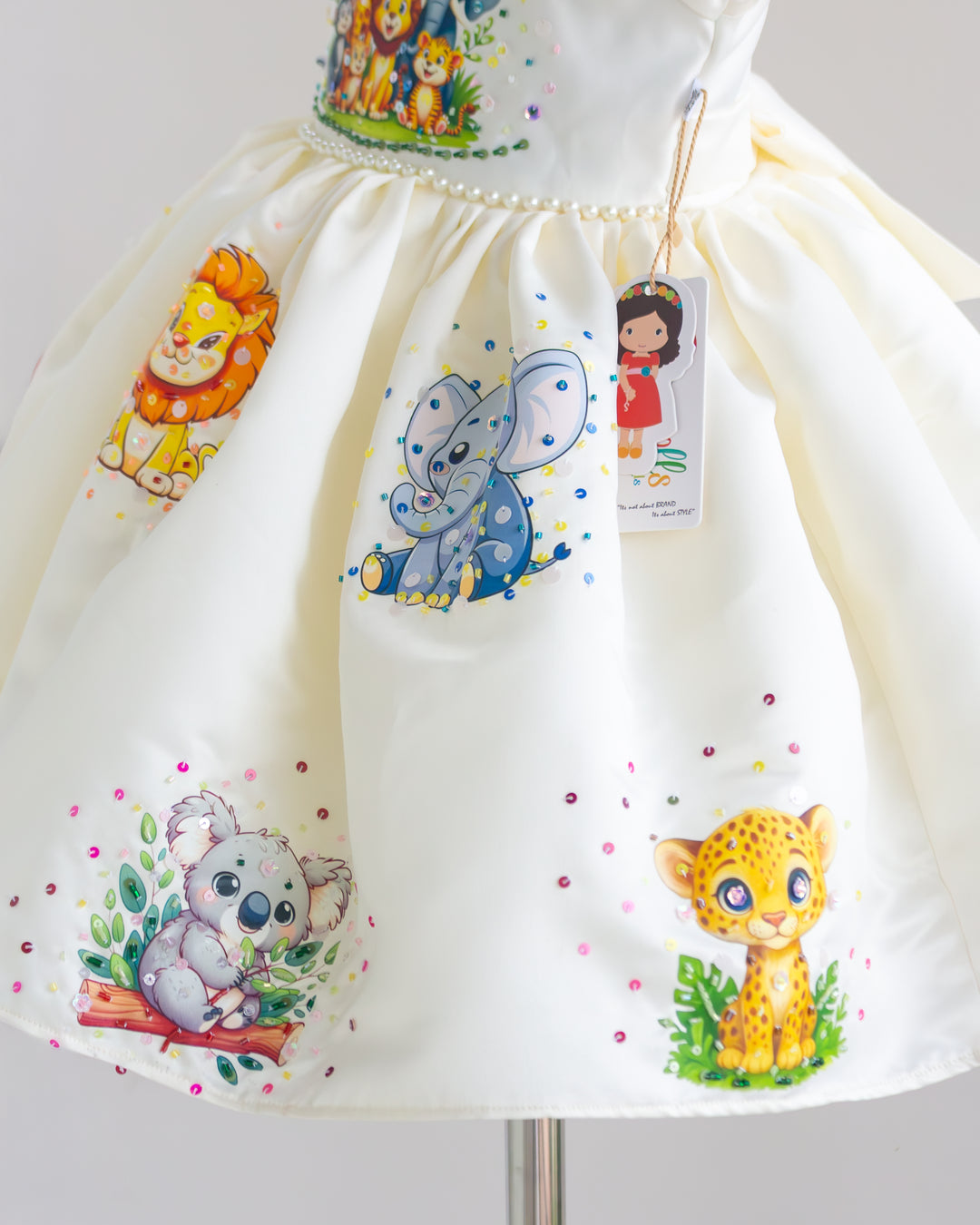 Back view of off white jungle theme handwork partywear frock – Stanwells Kids