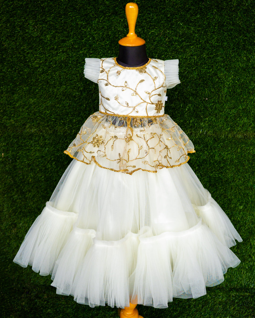 Off white and gold thread embroidery net lehenga choli for baby girl – front view, Stanwells Kids