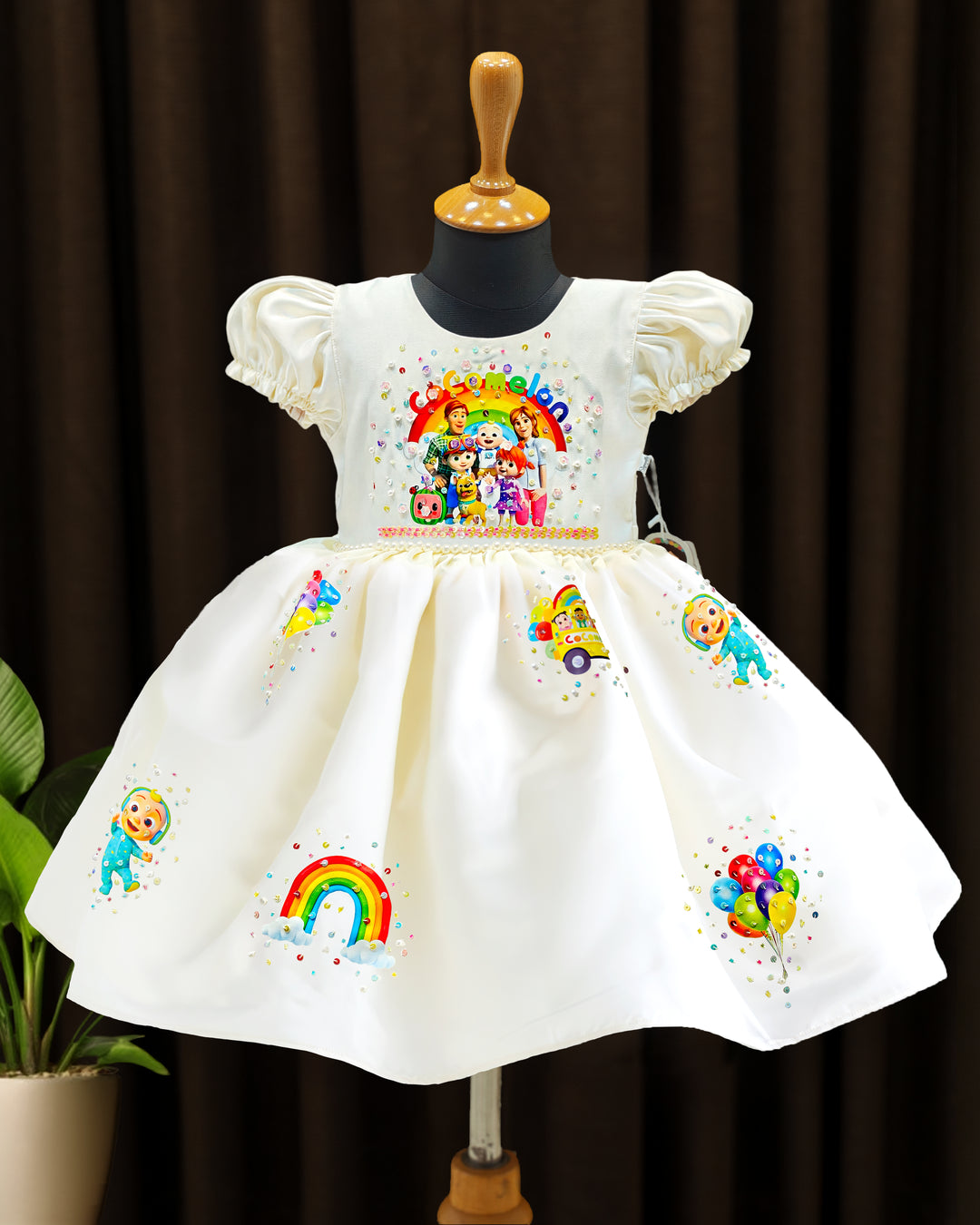 Off white silky satin Cocomelon theme handwork birthday frock for baby girl – front view, Stanwells Kids