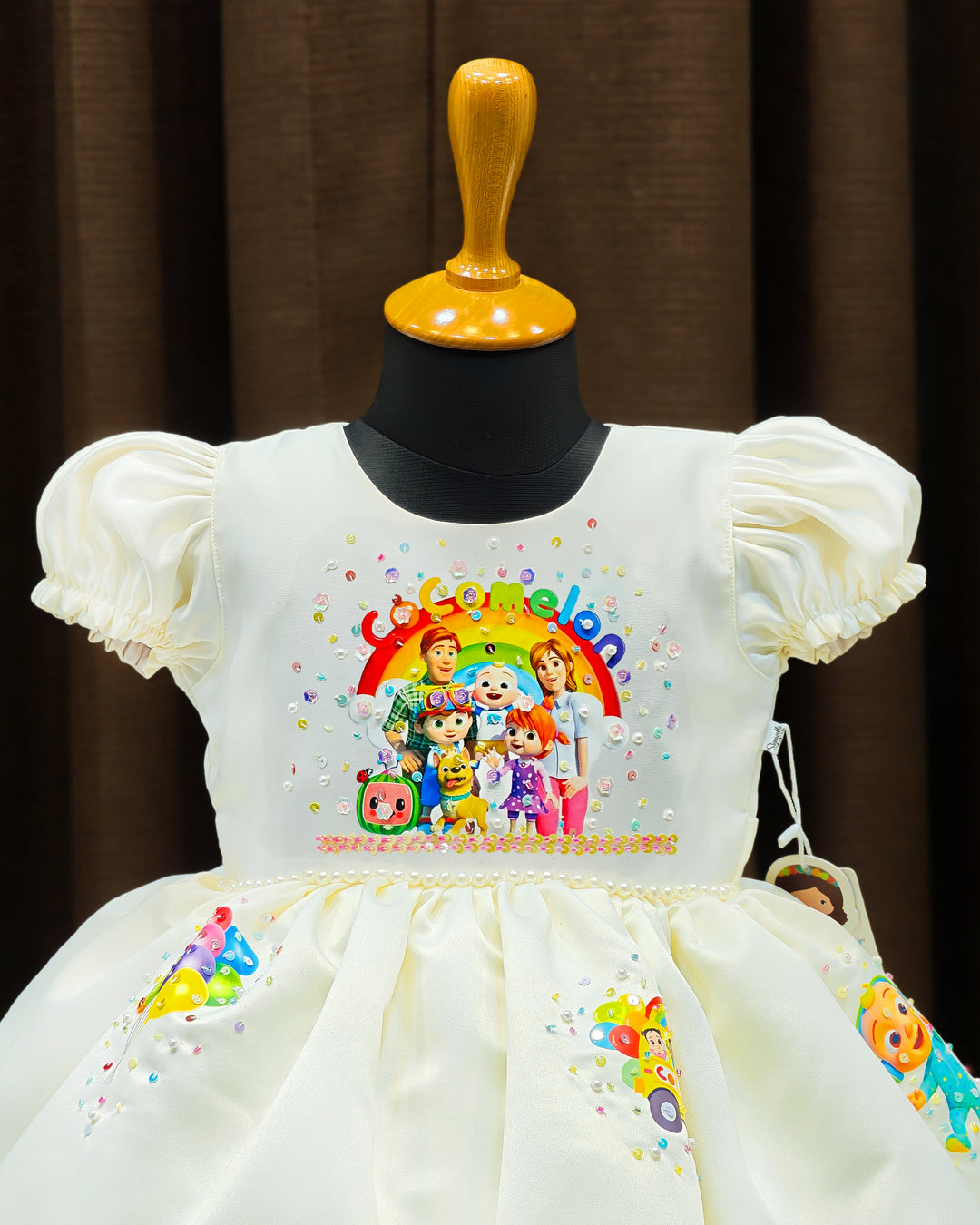 Cocomelon theme handwork detailing on off white silky satin birthday frock – Stanwells Kids