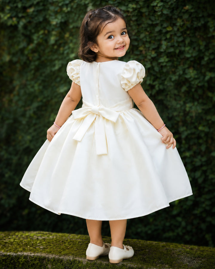 Off white satin jungle theme frock detail shot – Stanwells Kids
