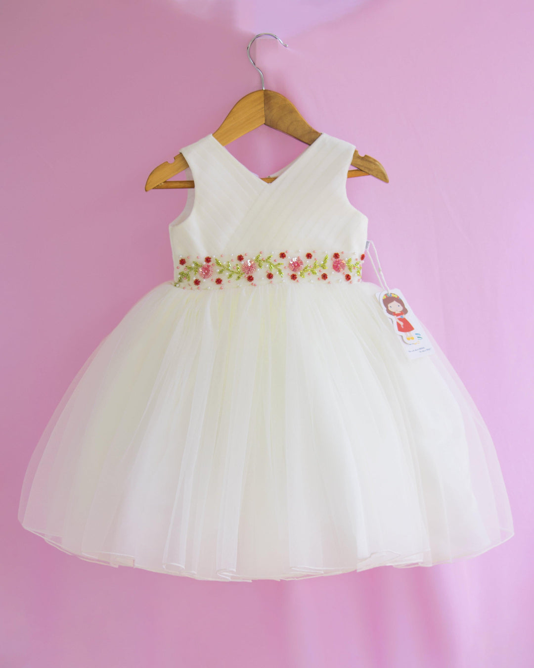 Off-white Shade Pleated Handwork Baby-Girls Sleeveless Frock
Material : Off-white shade pleated party perfect handwork frock is made with soft nylon net fabric. The yoke portion of the frock is designed in pleated with V-neck