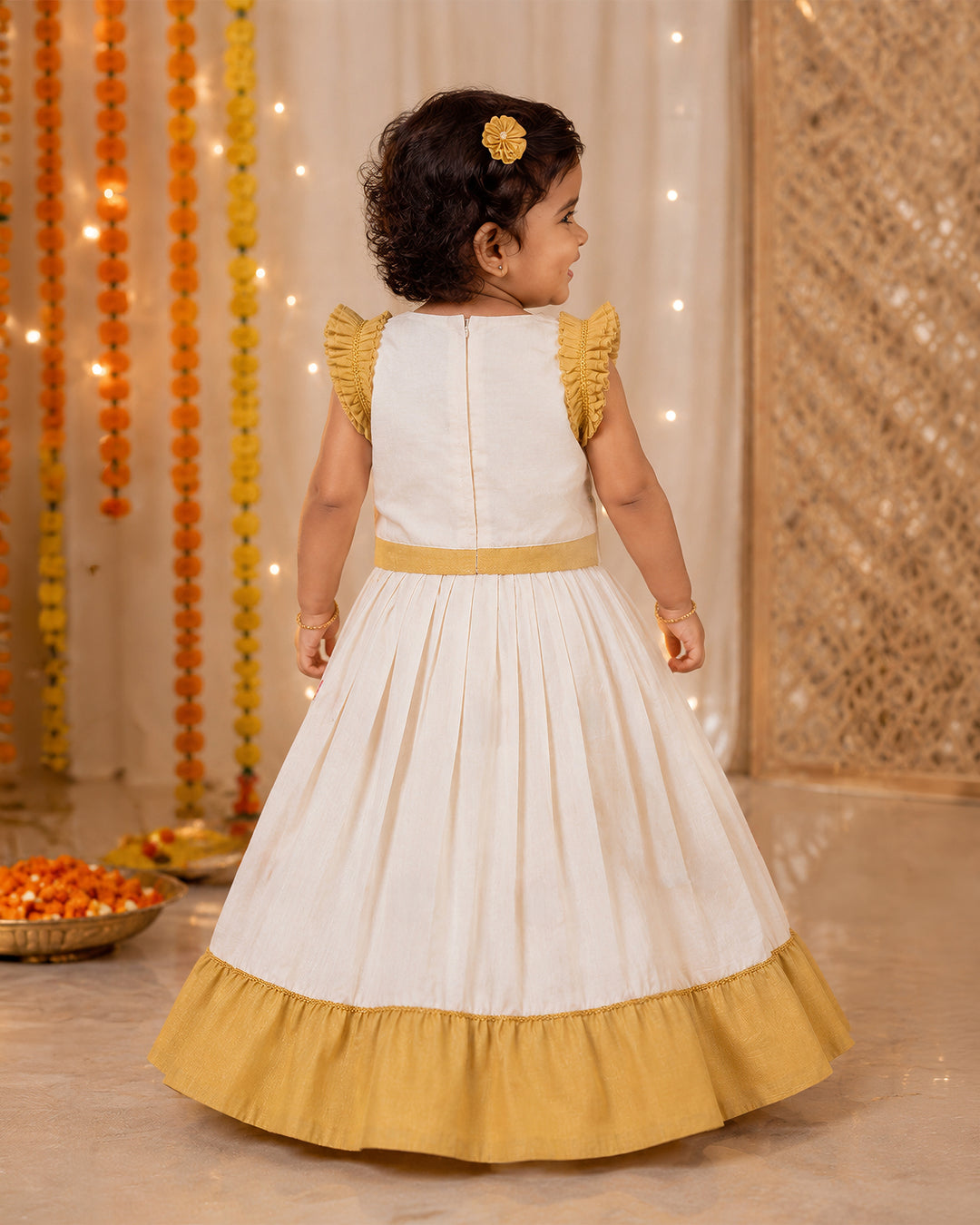 Lotus motif pleated skirt on Onam Krishna lehenga for baby girl – Stanwells Kids