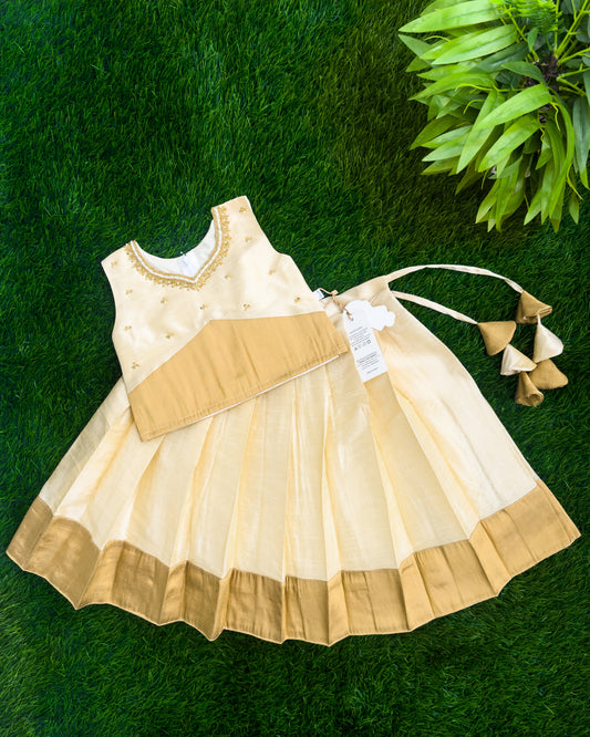 Onam special cream silk lehenga choli for baby girl – front view, Stanwells Kids