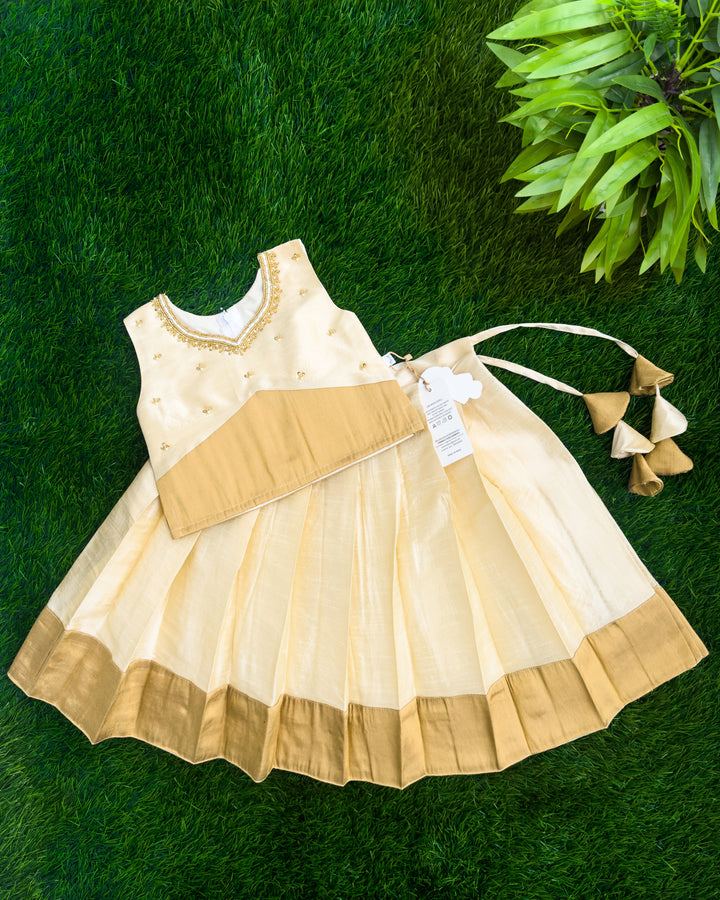 Onam special cream silk lehenga choli for baby girl – front view, Stanwells Kids