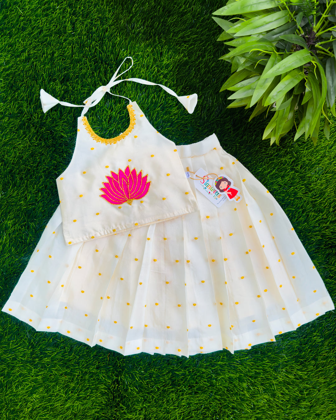 Onam special cream silk lotus hand embroidery lehenga for baby girl – front view, Stanwells Kids