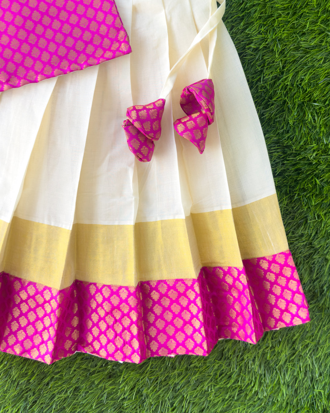 Back bow detail on cream pink Kasavu lehenga for girls, Stanwells Kids
