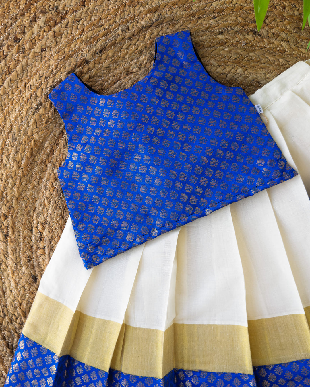 Royal blue brocade blouse with Kerala Kasavu skirt for Onam, Stanwells Kids