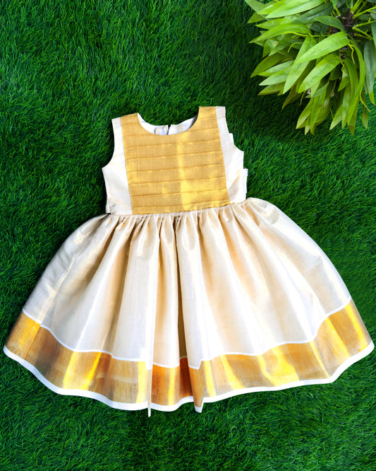 Onam special golden tissue frock for baby girl – front view, Stanwells Kids