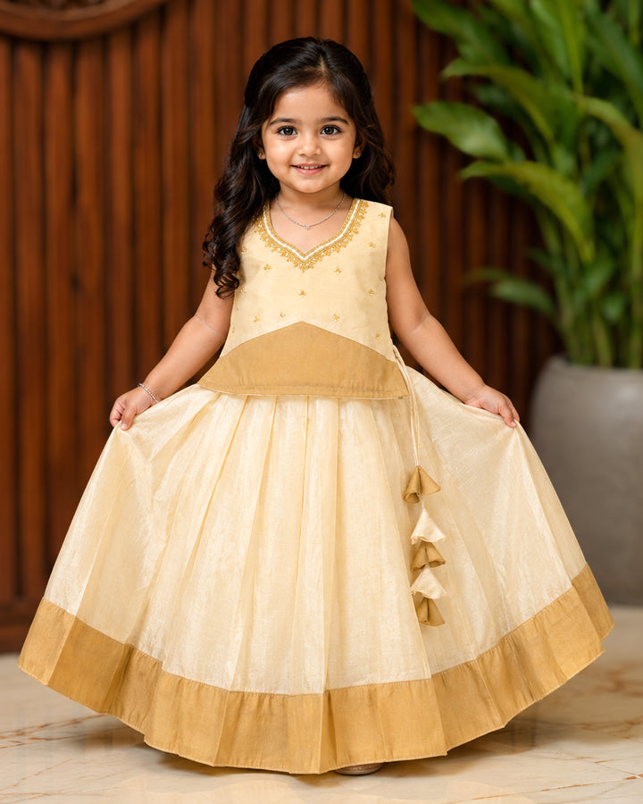 Onam special cream silk lehenga choli for baby girl – front view, Stanwells Kids