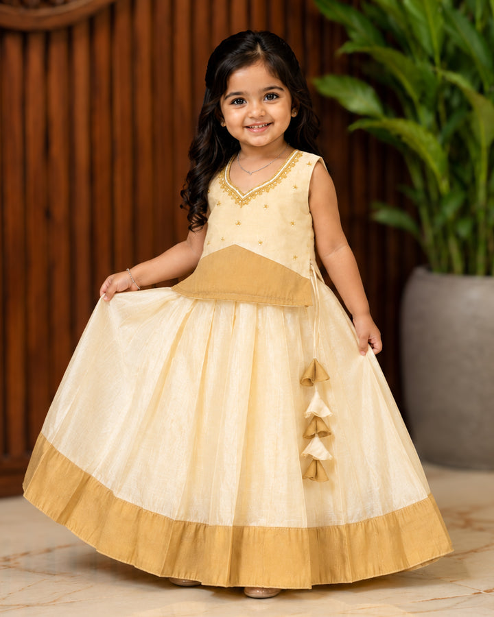 Onam special cream silk lehenga choli for baby girl – front view, Stanwells Kids
