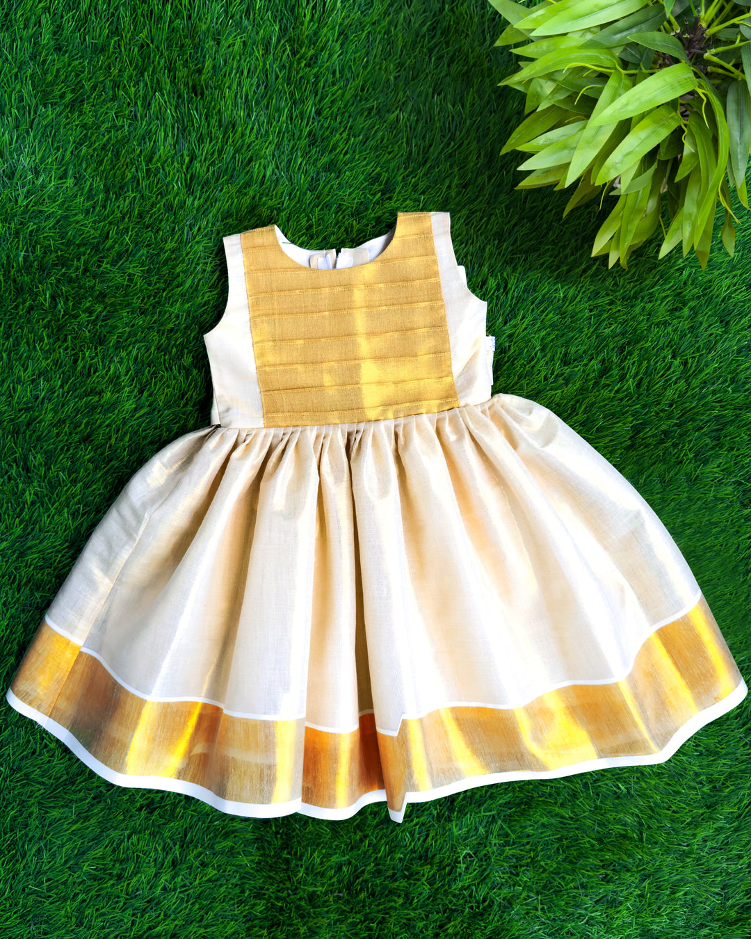 Onam special golden tissue frock for baby girl – front view, Stanwells Kids