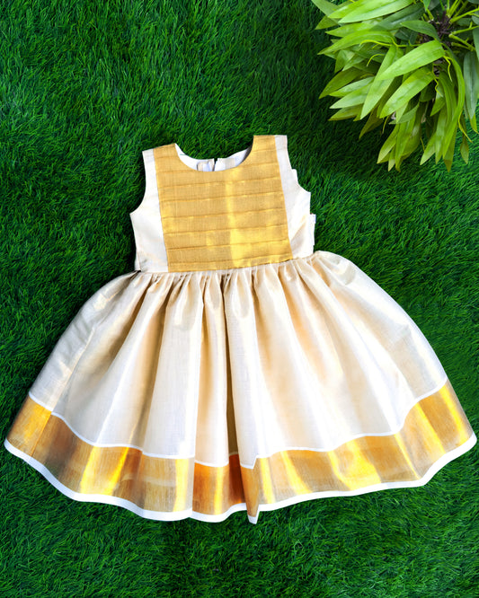 Onam special golden tissue frock for baby girl – front view, Stanwells Kids