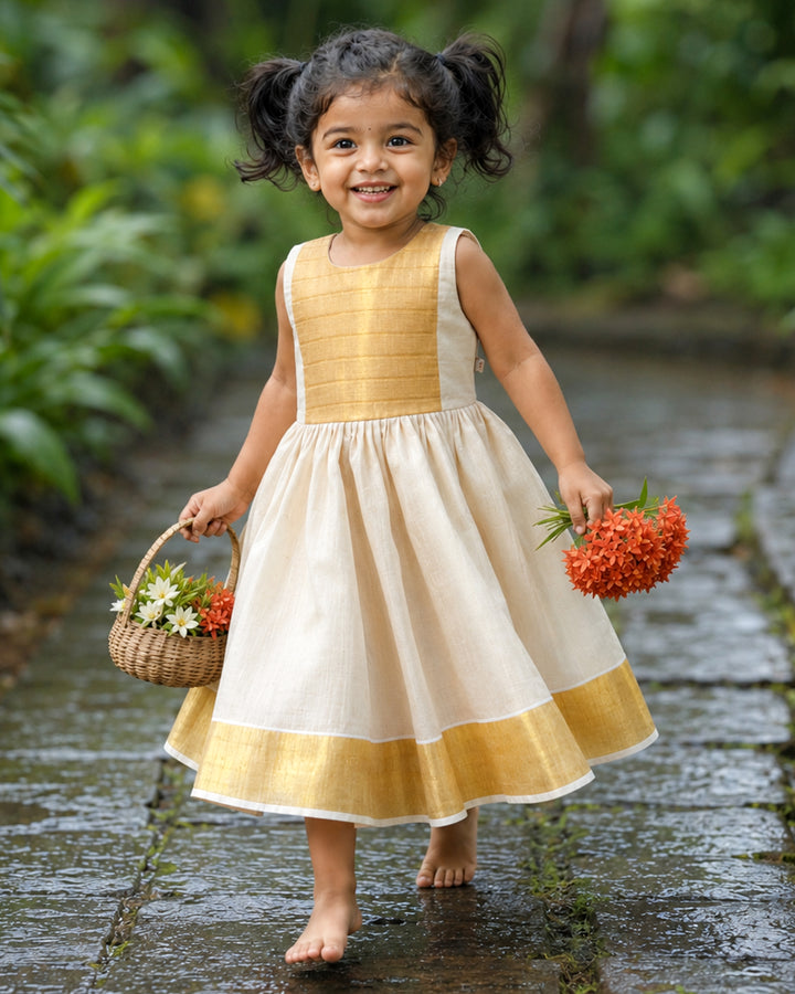 Cream base with golden Kasavu accents on Onam tissue frock – Stanwells Kids