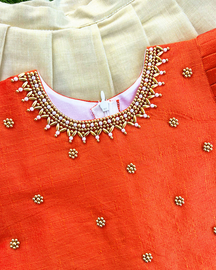 Baby girls traditional birthday dress – orange & gold Kerala Kasavu Lehenga Choli with handwork