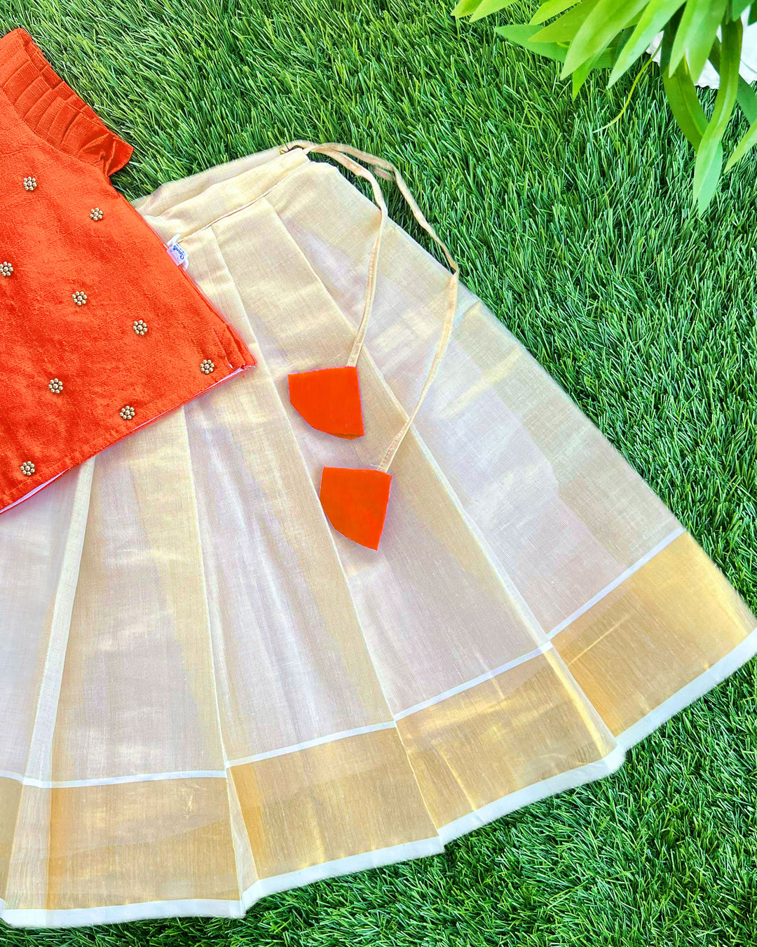 Baby girls traditional birthday dress – orange & gold Kerala Kasavu Lehenga Choli with handwork