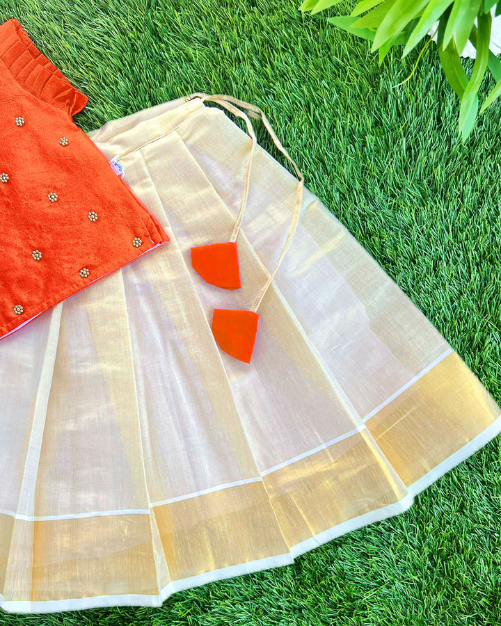 Baby girls traditional birthday dress – orange & gold Kerala Kasavu Lehenga Choli with handwork