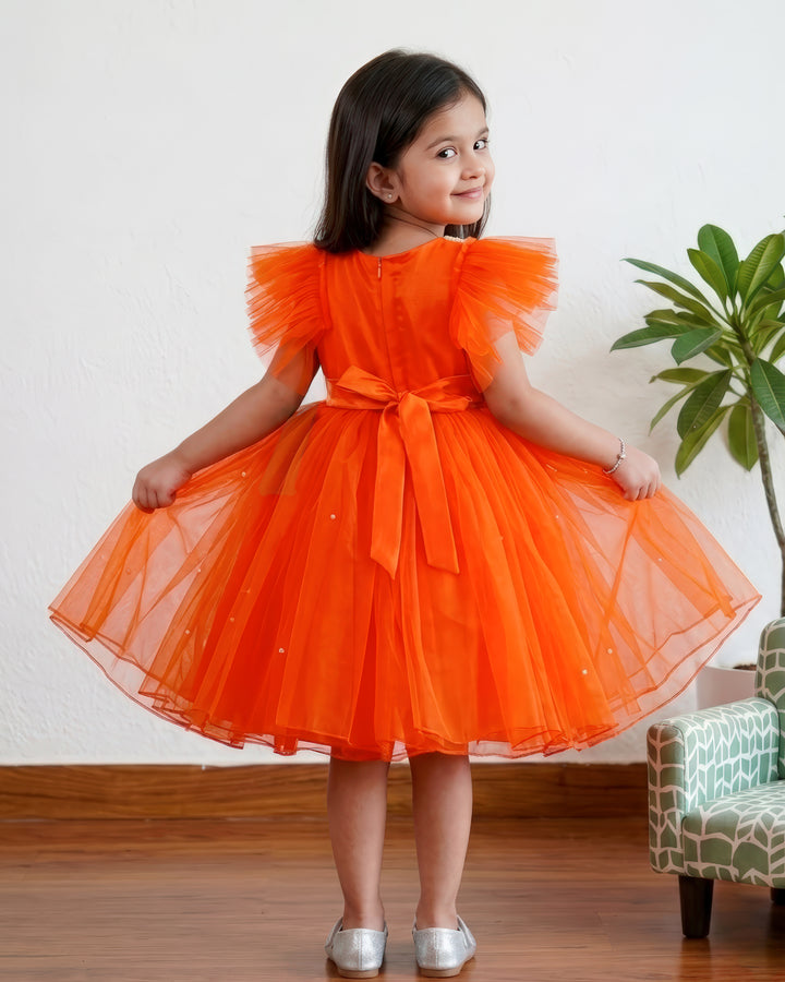 stanwells kids, orange frock, pearl work frock for kids, beads work frock, ruffles sleeves frocks, handwork frock for kids, liandli, nakshtarakids, janyas closet