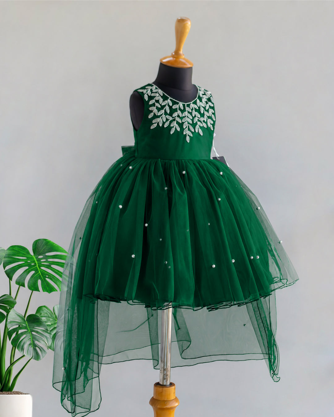 Bottle green party frock for girls with flared skirt and pearl detailing – Stanwells Kids