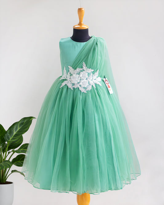 Pastel green saree style birthday gown for baby girl – front view, Stanwells Kids