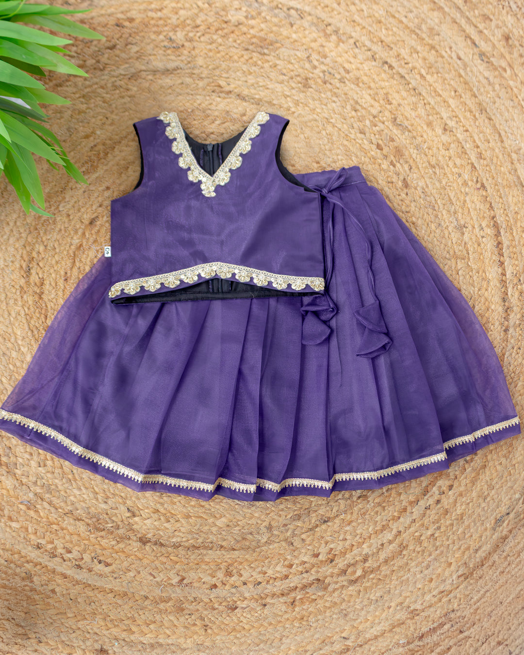 Pastel violet sleeveless silky net ethnic lehenga for baby girl – front view, Stanwells Kids